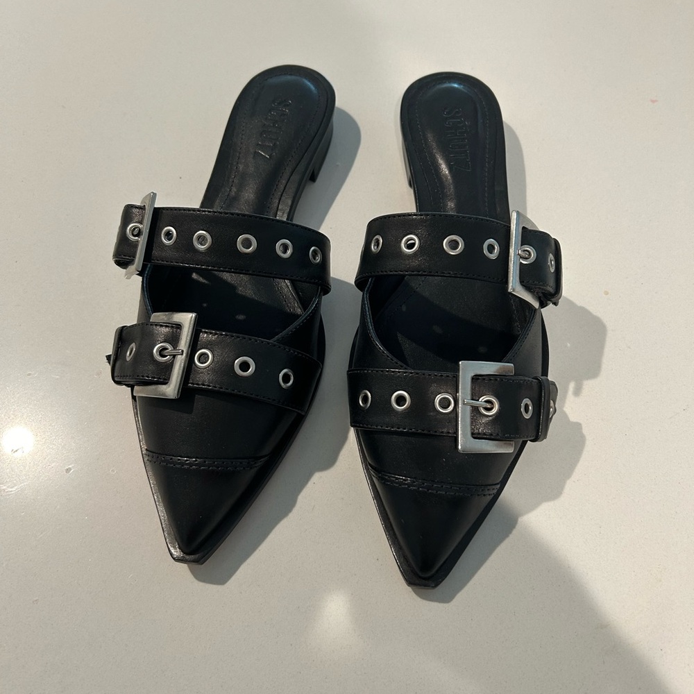 Schutz Penny Flat. Black buckle flat.